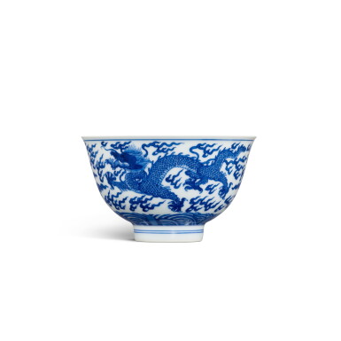 View full screen - View 1 of Lot 3337. A blue and white 'dragon' bowl, Mark and period of Kangxi | 清康熙 青花海水雲龍趕珠紋盌 《大清康熙年製》款.