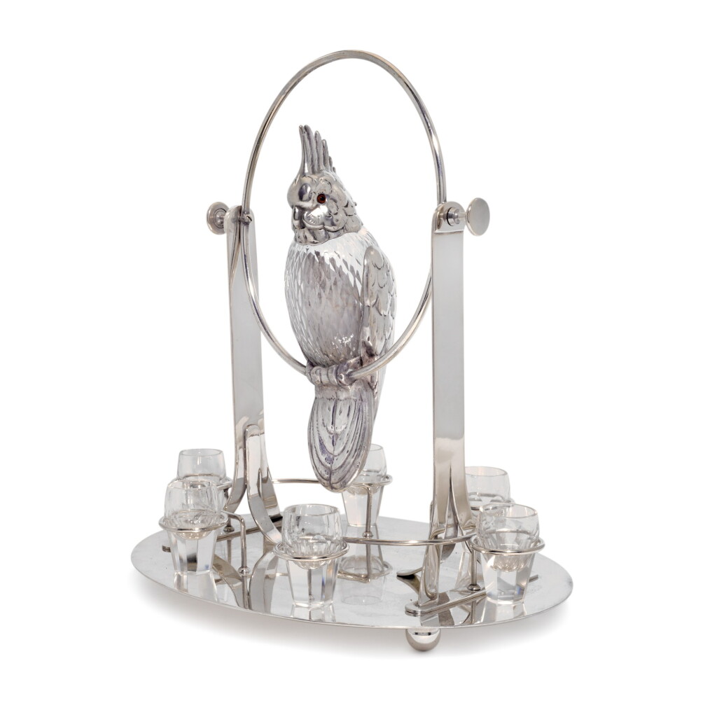 View full screen - View 1 of Lot 144. 'Party Animal': an electroplate-mounted six-shot cockatoo liqueur dispenser, unmarked, probably Austrian, circa 1930.