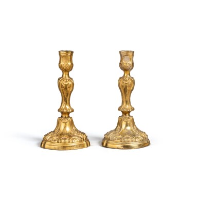 View full screen - View 1 of Lot 130. A pair of gilt-bronze candlesticks, Louis XV, circa 1750 | Paire de flambeaux en bronze doré d'époque Louis XV, vers 1750.