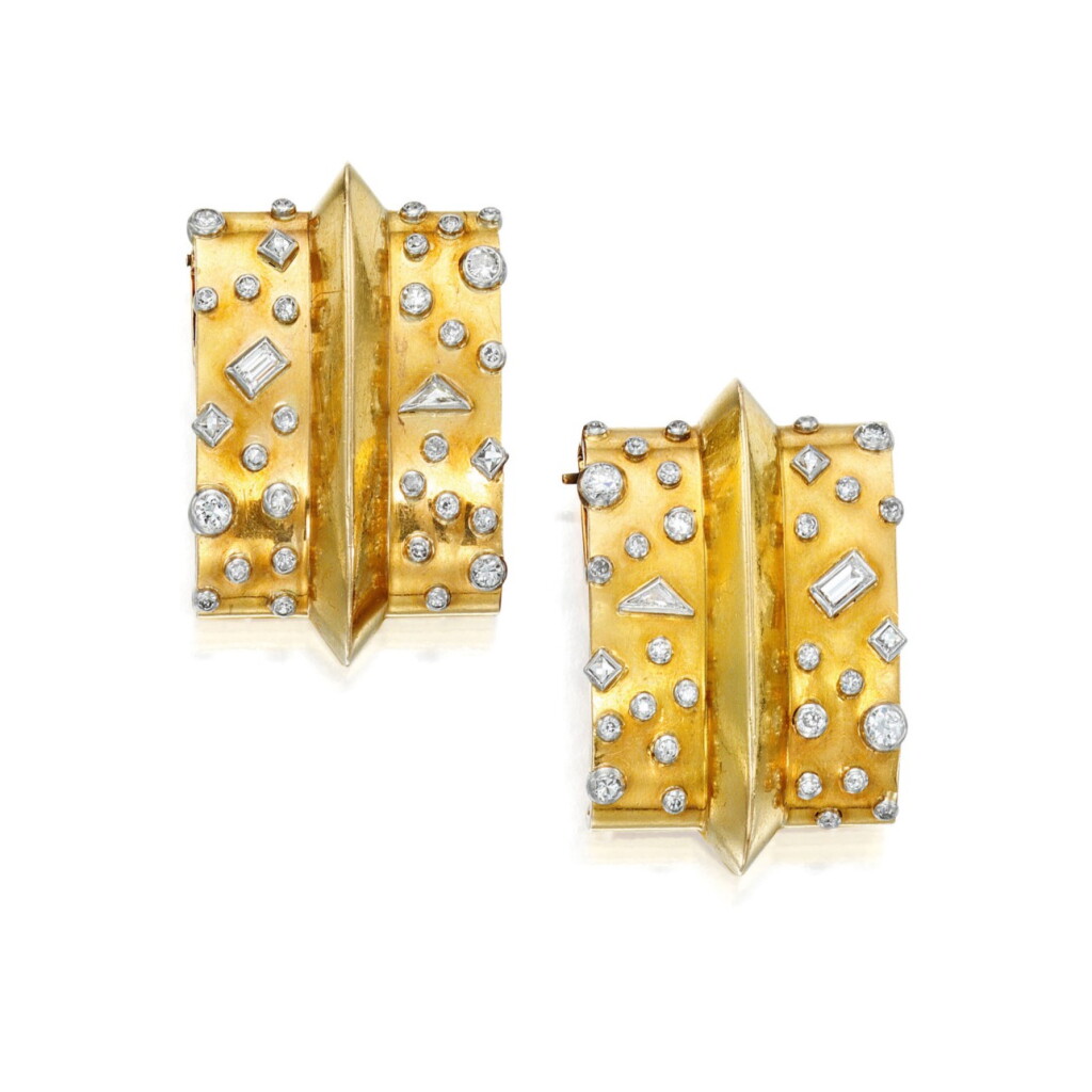 View full screen - View 1 of Lot 185. Suzanne Belperron | Two Gold and Diamond Clips, France.