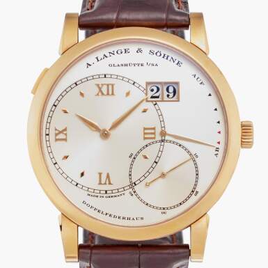 View full screen - View 1 of Lot 82. Reference 115.022 Grand Lange 1 | A yellow gold wristwatch with digital date display and power reserve indication, Circa 2009.