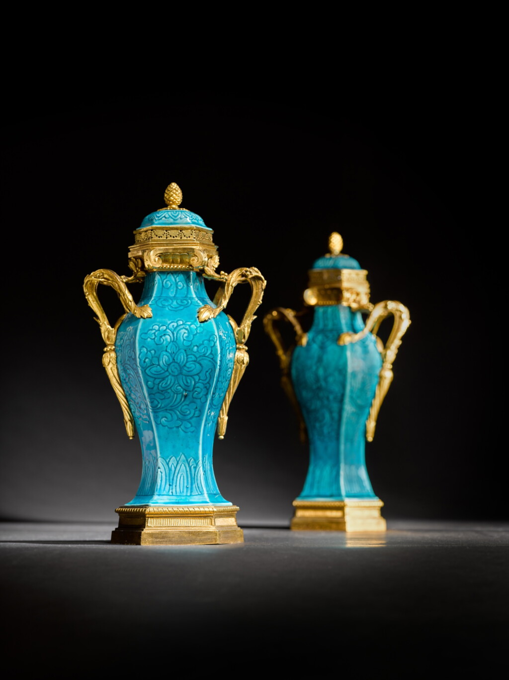 View full screen - View 1 of Lot 72. A pair of Louis XV gilt-bronze mounted Chinese turquoise-glaze pot-pourri vases and covers, the porcelain Kangxi (1662-1722).
