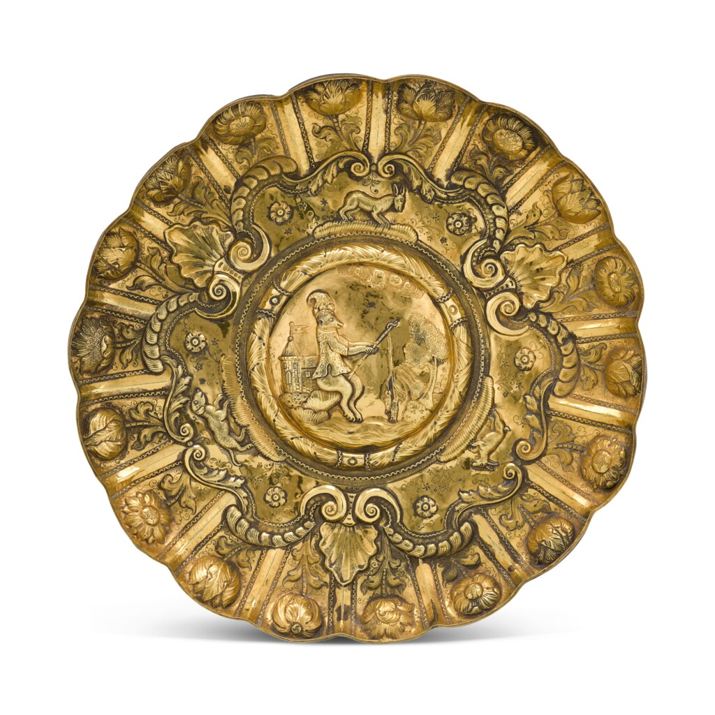 View full screen - View 1 of Lot 35. A large silver-gilt dish or basin, with assay scrape but seemingly unmarked, probably Portuguese and circa 1700.