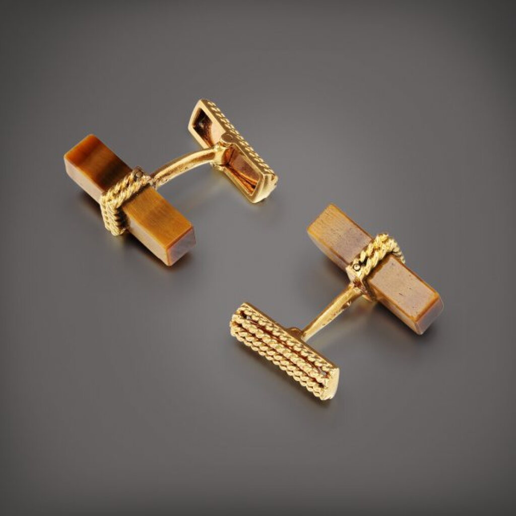 View full screen - View 1 of Lot 734. Paire de boutons de manchette oeil de tigre | Pair of tiger's eye cufflinks.
