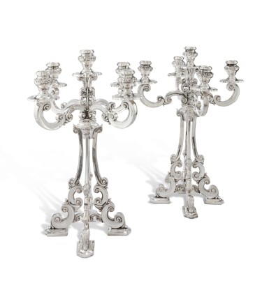 View full screen - View 1 of Lot 128. A pair of Italian large silver five-light candelabra, Buccellati, Milan, modern | Paire de grands chandeliers à cinq lumières en argent par Buccellati, Milan, moderne.