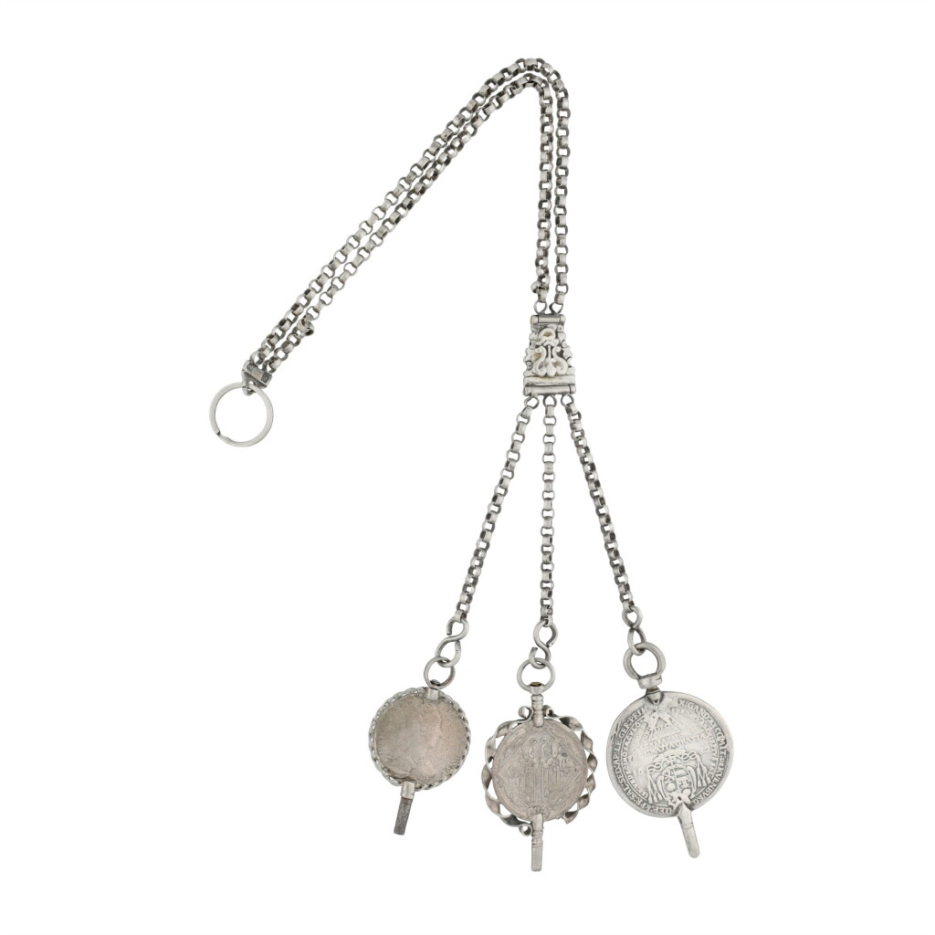 View full screen - View 1 of Lot 198. A long watch key, a key in the form of a harp, silver chatelaine and keys Largely 19th century.