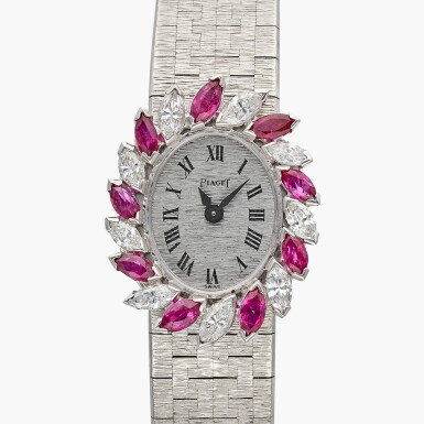 View full screen - View 1 of Lot 702. Reference 3772 A 6 | A white gold, diamond and ruby set wristwatch with bracelet, Circa 1975.