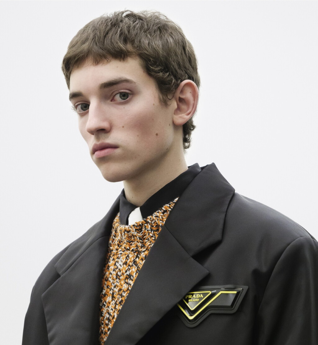 View full screen - View 1 of Lot 70. PRADA | RE-NYLON COAT, CASHMERE AND WOOL SWEATER , POPLIN SHIRT, TIE WORN BY ROMAN FIRONOV.