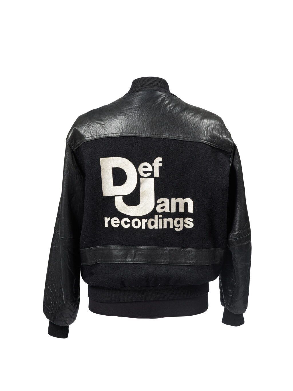 View full screen - View 1 of Lot 51. "Word Up!" editor Kate Ferguson's personalized Def Jam jacket, ca. 1989.