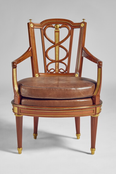 View full screen - View 1 of Lot 201. A German Neoclassical Brass-Mounted Mahogany Armchair Attributed to David Roentgen, Circa 1785.