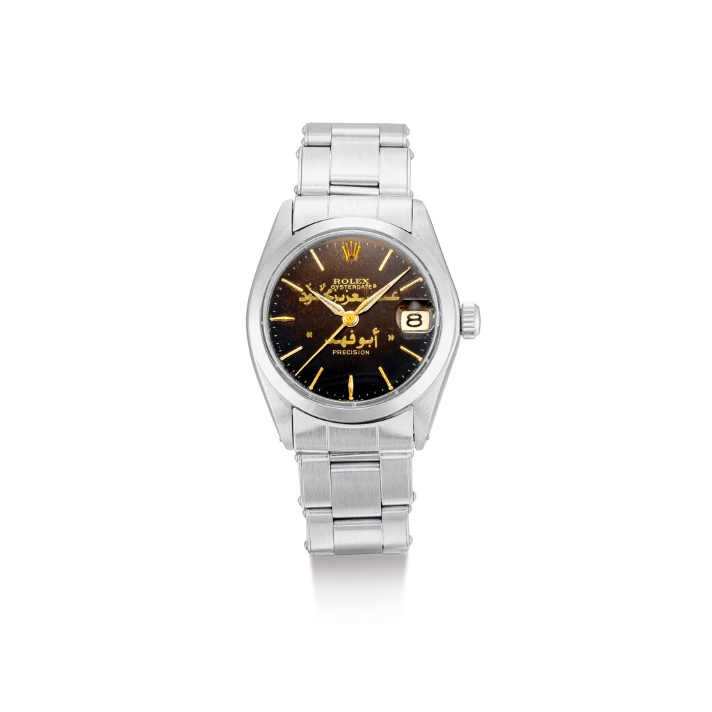 View full screen - View 1 of Lot 2106. ROLEX | REFERENCE 6466, A STAINLESS STEEL WRISTWATCH WITH TROPICAL DIAL, DATE AND BRACELET, CIRCA 1975 | 勞力士 | "型號6466 精鋼鏈帶腕錶,備棕色錶盤及日期顯示,錶殼編號3994651,約1975年製".