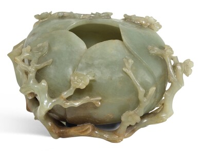 View full screen - View 1 of Lot 101. A CELADON JADE 'PRUNUS' WASHER, QING DYNASTY, 19TH CENTURY | 清十九世紀 青白玉桃花形洗.