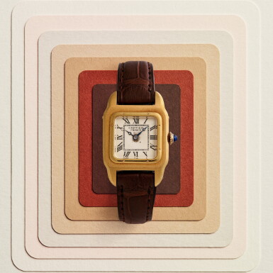 View full screen - View 1 of Lot 145. Santos | A lady’s yellow gold cushion-form wristwatch with a gold deployant buckle | Circa 1922.