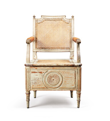 View full screen - View 1 of Lot 39. A Louis XVI grey-painted carved wood fauteuil de commodité, circa 1780 | Fauteuil de commodité en bois sculpté et peint d’époque Louis XVI, vers 1780.