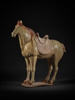 A straw and chestnut-glazed pottery figure of a horse, Tang dynasty | 唐 三彩馬