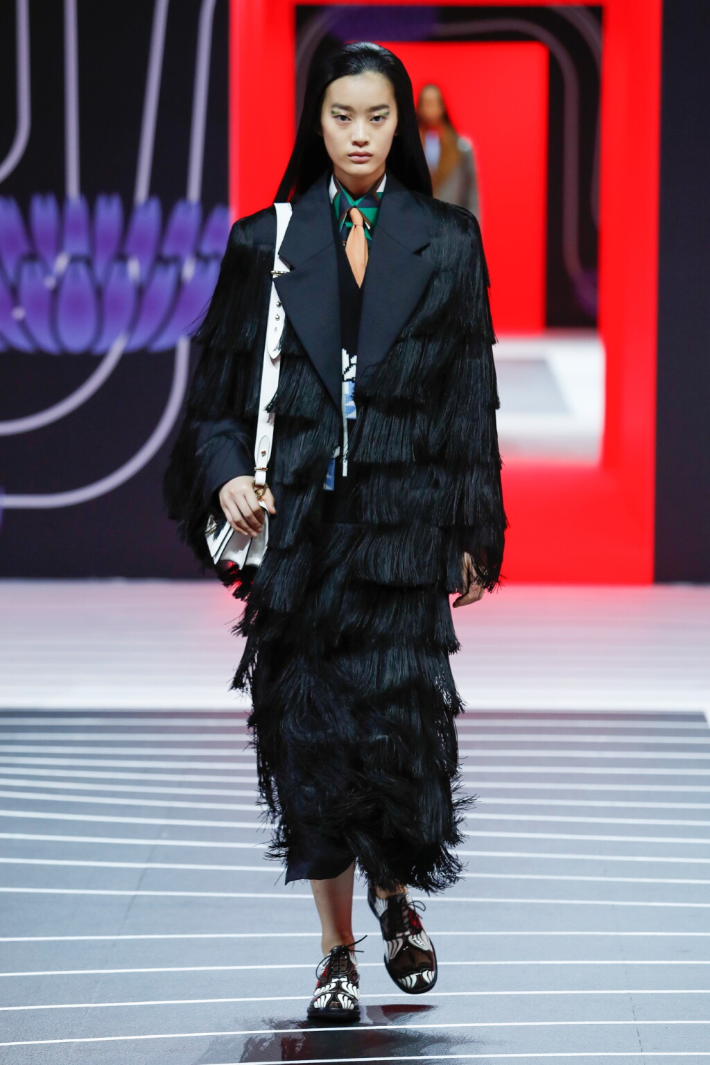 View full screen - View 1 of Lot 36. PRADA | FRINGED MOHAIR SKIRT AND JACKET, CUBE PRINT POPLIN SHIRT, WOOL SWEATER AND POPLIN TIE, WORN BY RUIQI JIANG.