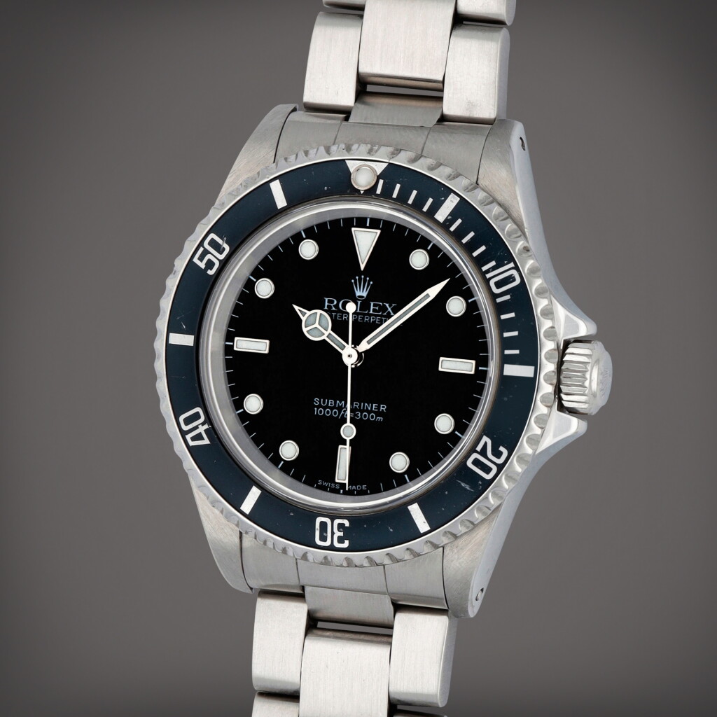 View full screen - View 1 of Lot 209. Submariner, Reference 14060M | A stainless steel wristwatch with bracelet | Circa 2002.