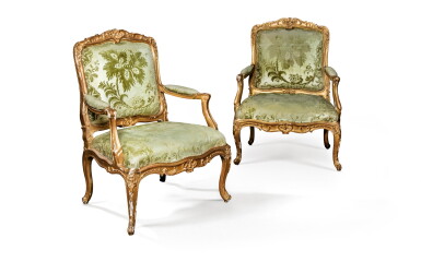 View full screen - View 1 of Lot 42. A pair of Louis XV giltwood fauteuils à châssis, Louis XV, circa 1750 | Paire de fauteuils à châssis en bois doré d'époque Louis XV, vers 1750.