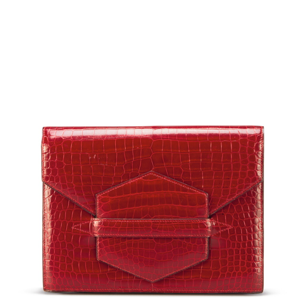 View full screen - View 1 of Lot 64. Rouge H Shiny Porosus Crocodile Faco Cutch Gold Hardware, 1988.