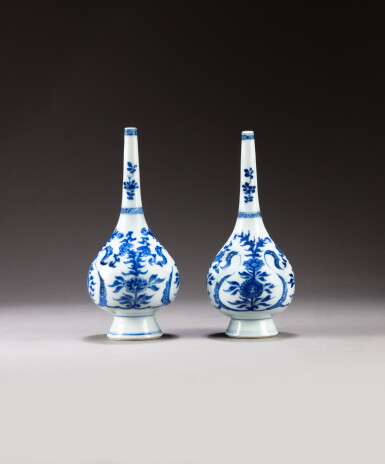 View full screen - View 1 of Lot 210. A pair of blue and white 'floral' sprinklers Qing dynasty, Kangxi period | 清康熙 青花花卉紋長頸瓶一對.