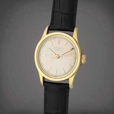 View full screen - View 1 of Lot 157. Reference 2555 | A yellow gold wristwatch, Circa 1955.