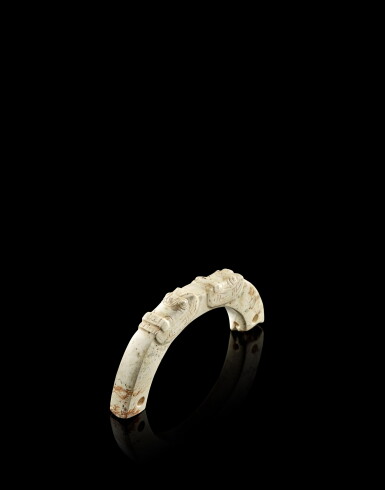 View full screen - View 1 of Lot 3745. A rare jade 'mask' ornament, huang, Neolithic period, Liangzhu culture | 新石器時代 良渚文化獸面紋玉璜.