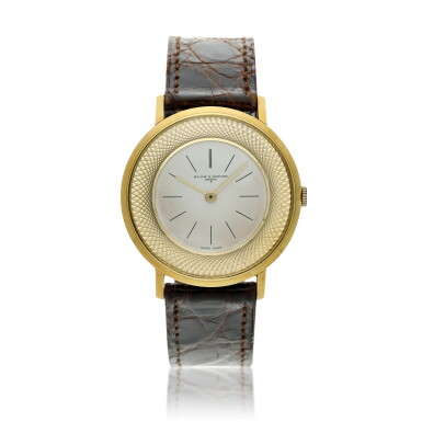 View full screen - View 1 of Lot 104. A yellow gold wristwatch, Circa 1970.