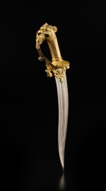 A magnificent and important zoomorphic gilt-copper dagger set with rubies and emeralds, India, Deccan, Bijapur or Golconda, late 16th century