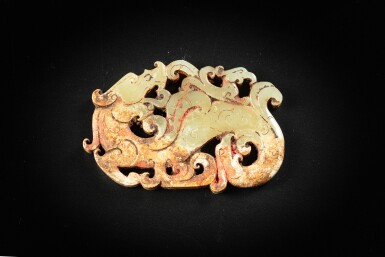 View full screen - View 1 of Lot 91. An archaistic celadon jade reticulated ‘mythical beast’ pendant, Probably Qing dynasty in Warring States style | 或為清 戰國時期風格 玉透雕瑞獸紋牌.