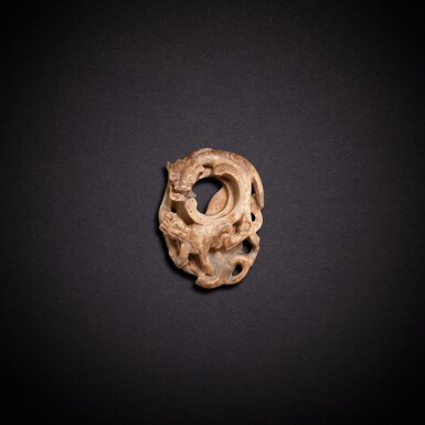 View full screen - View 1 of Lot 9454. A celadon jade 'chilong' 'archer's ring' pendant, Western Han dynasty | 西漢 青玉螭龍紋韘形珮.