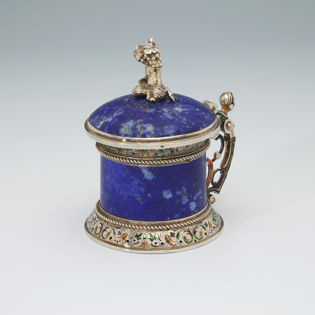View full screen - View 1 of Lot 49. A MINIATURE SILVER-GILT, ENAMEL, AND HARDSTONE AUSTRIAN TANKARD | HERMANN RATZERSDORFER, VIENNA | CIRCA 1875.