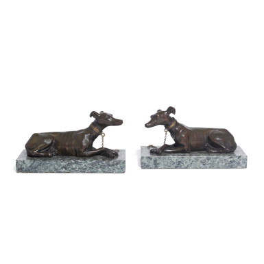 View full screen - View 1 of Lot 86. A pair of Regency bronze models of recumbent greyhounds, first quarter 19th century.