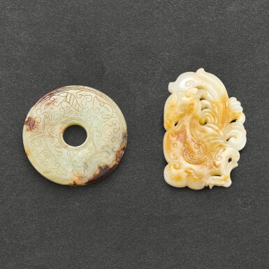 View full screen - View 1 of Lot 588. A WHITE AND RUSSET JADE 'PHOENIX' PLAQUE AND AN ARCHAISTIC YELLOWISH-CELADON JADE INCISED 'CHILONG' BI DISC QING DYNASTY | 清 白玉鏤雕鳳凰珮 及 青白玉螭龍璧一組兩件.