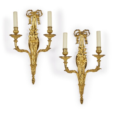 View full screen - View 1 of Lot 74. A Pair of Louis XVI Gilt-Bronze Two-Branch Wall Lights, Circa 1780 .