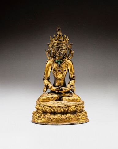View full screen - View 1 of Lot 57. A gilt-bronze figure of Amitayus, Tibet, 15th - 16th century | 西藏 十五至十六世紀 鎏金銅無量壽佛坐像.