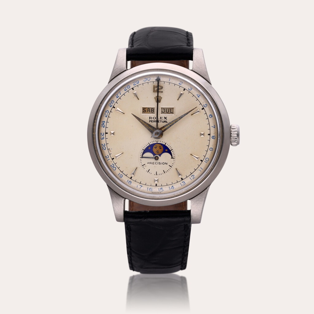 View full screen - View 1 of Lot 663. Reference 8171 ‘Padellone’ | A stainless steel automatic triple calendar wristwatch with moon phases, Circa 1950.