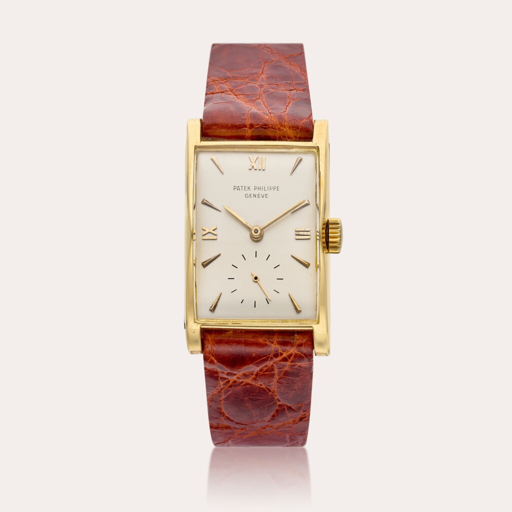 View full screen - View 1 of Lot 465. Reference 1588 | A yellow gold rectangular wristwatch, Circa 1945.