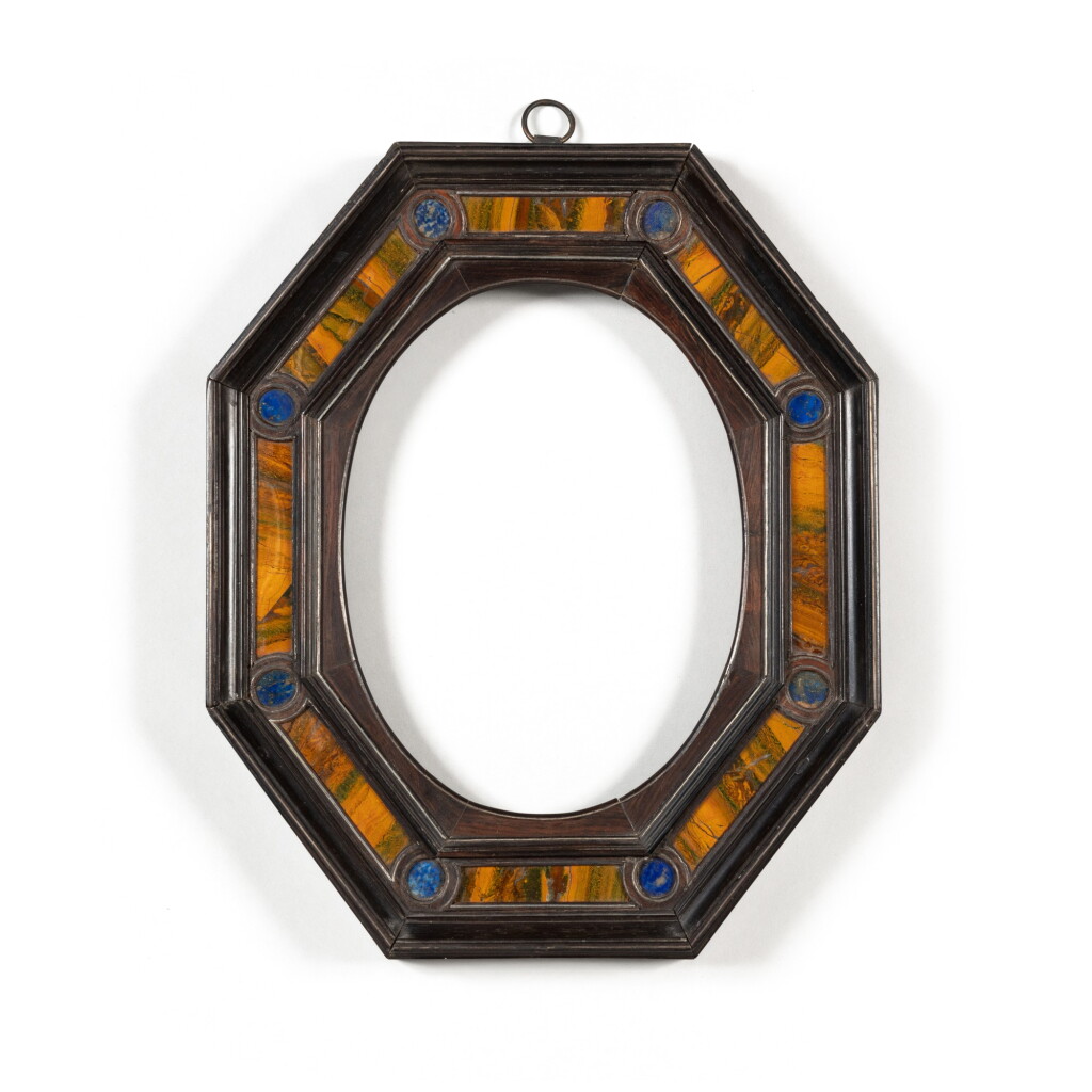 View full screen - View 1 of Lot 68. An Italian jasper and lapis lazuli inset silver inlaid rosewood and ebony octagonal frame, Rome, 17th century| Cadre octogonal italien en palissandre et ébène avec des incrustations d'argent, jaspe et lapis-lazuli, Rome, XVIIeme siècle.
