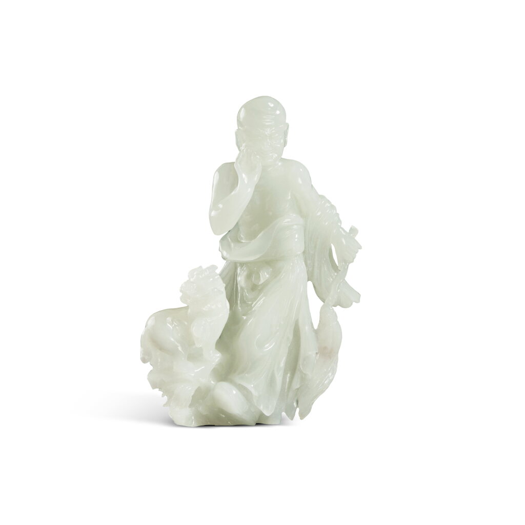 View full screen - View 1 of Lot 48. A white jade figure of Vajraputra, 19th / 20th century .