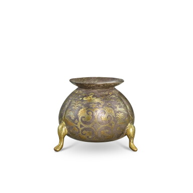 View full screen - View 1 of Lot 3611. A parcel-gilt silver 'floral and animal' tripod incense burner, Tang dynasty | 唐 銀局部鎏金卷草獸紋三足爐.