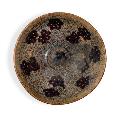 View full screen - View 1 of Lot 1140. A 'Jizhou' 'papercut' 'prunus' bowl, Southern Song dynasty | 南宋 吉州窰剪紙貼梅花紋盌.