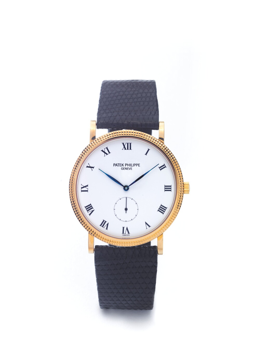 View full screen - View 1 of Lot 51. PATEK PHILIPPE | REF 3919J, A YELLOW GOLD WRISTWATCH CIRCA 1985 .