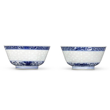View full screen - View 1 of Lot 131. A pair of blue and white 'dragon' 'rice' bowls, Marks and period of Guangxu | 清光緒 青花米通龍紋盌一對 《大清光緒年製》款.