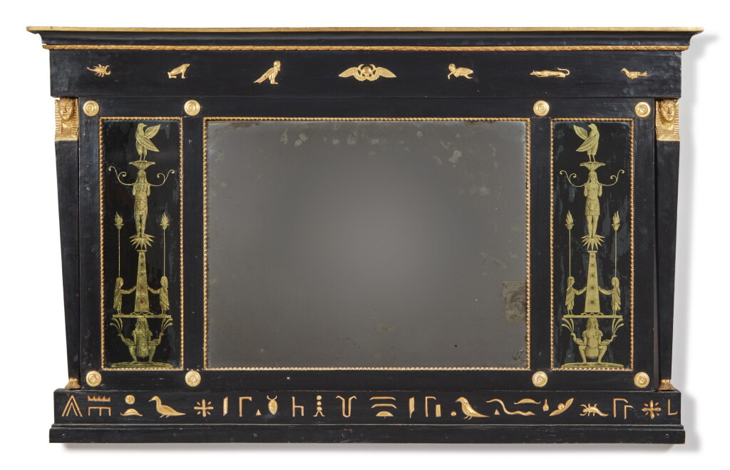 View full screen - View 1 of Lot 129. A REGENCY EGYPTIAN REVIVAL EBONIZED, PARCEL-GILT, AND VERRE EGLOMISE OVERMANTEL MIRROR, EARLY 19TH CENTURY AND LATER.
