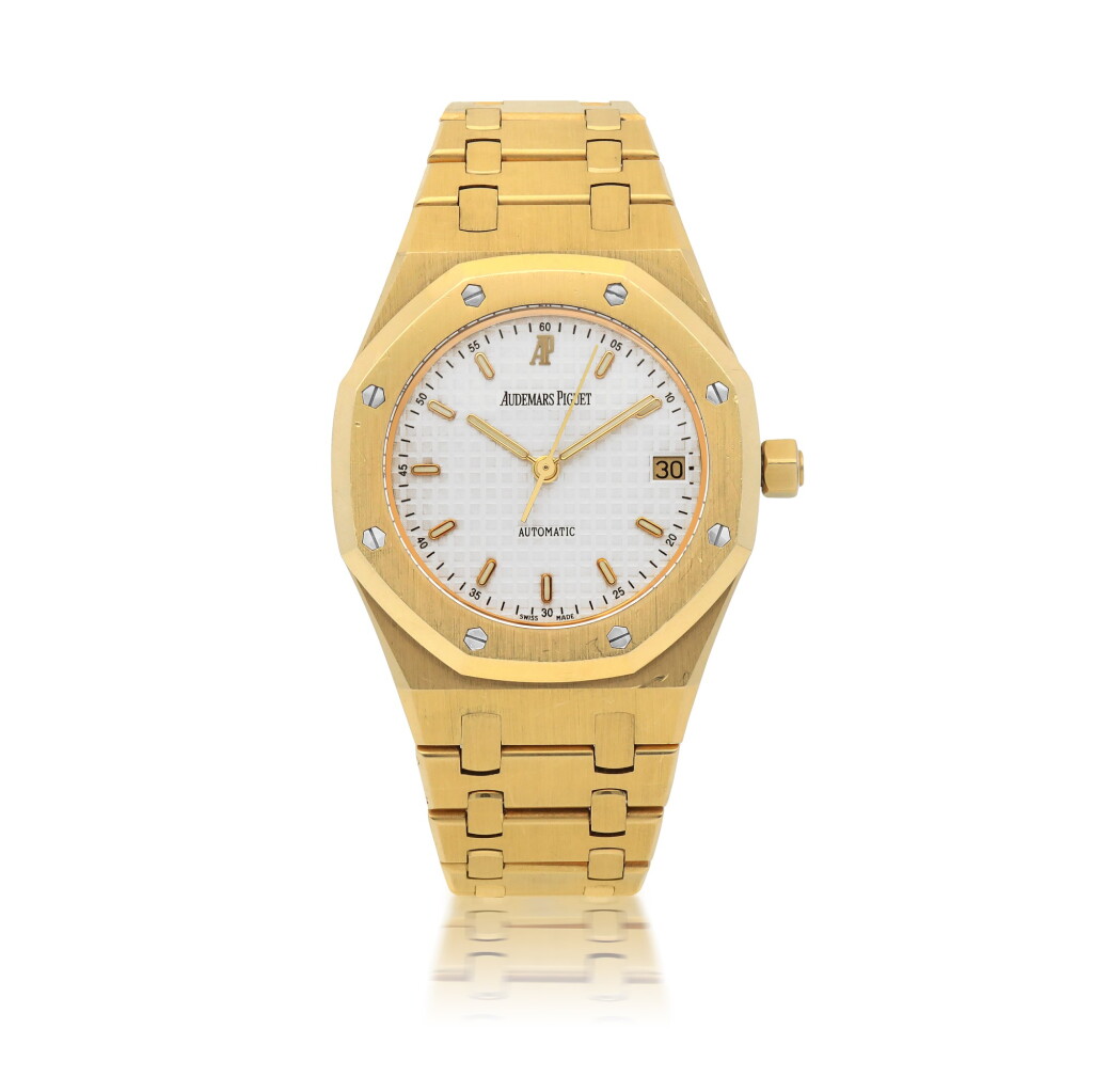 View full screen - View 1 of Lot 101. AUDEMARS PIGUET | ROYAL OAK, REF 14790.BA YELLOW GOLD WRISTWATCH WITH DATE AND BRACELET CIRCA 2000.