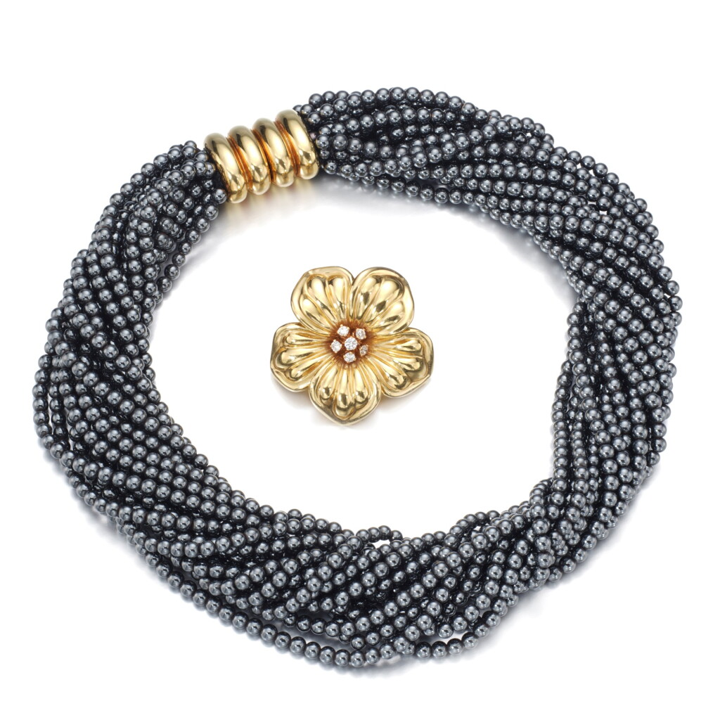 View full screen - View 1 of Lot 101. Hematite necklace, attributed to Poiray and a gold and diamond brooch, Van Cleef & Arpels.
