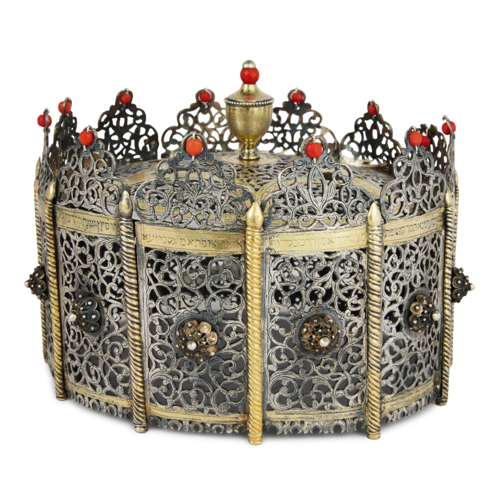 View full screen - View 1 of Lot 81. An Important Algerian Parcel-Gilt Silver Torah Crown, signed Makhlouf Oznenu, Mascara, dated 1868.