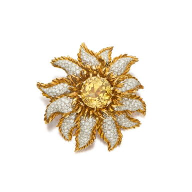 View full screen - View 1 of Lot 101. Gold, Yellow Sapphire and Diamond Clip-Brooch.