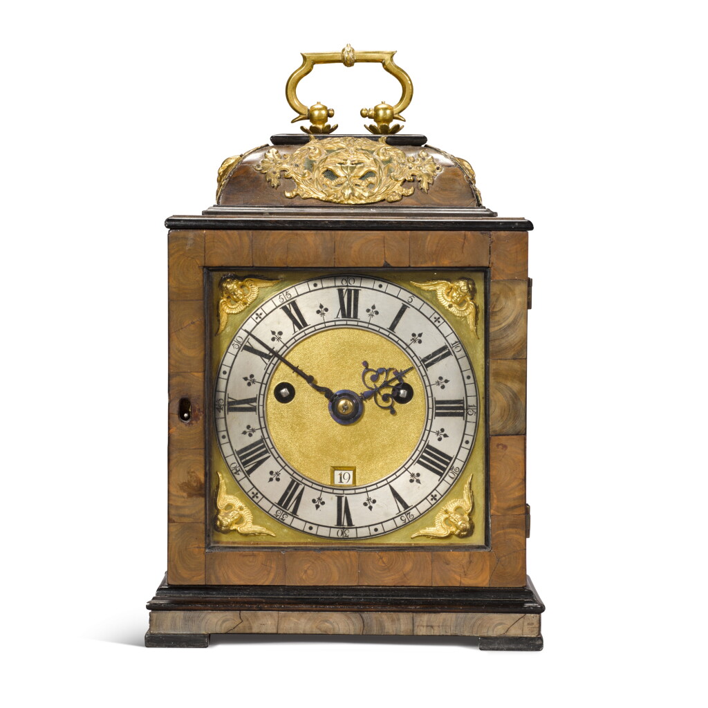 View full screen - View 1 of Lot 28. A small olivewood table clock, Henry Jones, London, circa 1690 and later, case, dial and movement associated.