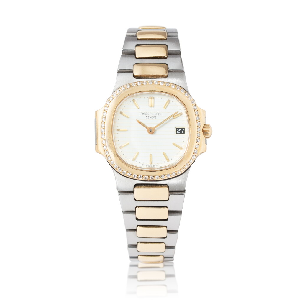 View full screen - View 1 of Lot 1033. A Patek Philippe Nautilus Ladies gold and steel wristwatch with diamonds, ref. 4700.
